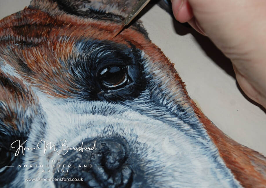 Adding the small detail to the fur on a fawn Boxer dog acrylic painting
