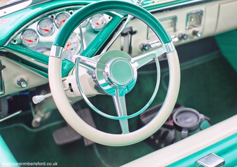 The steering wheel and dashboard of an upgraded 1956 Mercury Montclair